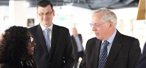 HRH Duke of Gloucester talking with a group