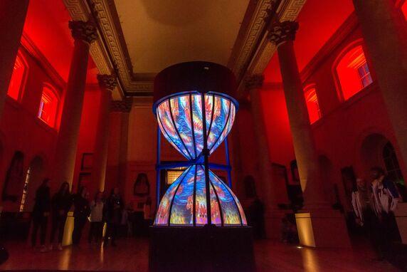 Atmospheric light installation in the shape of a large hourglass