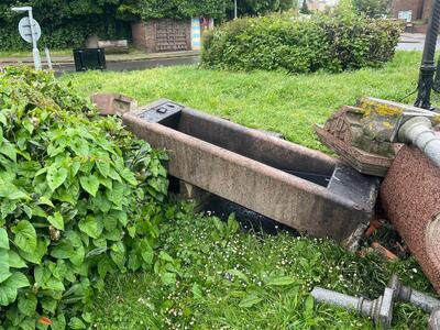 damaged horse trough