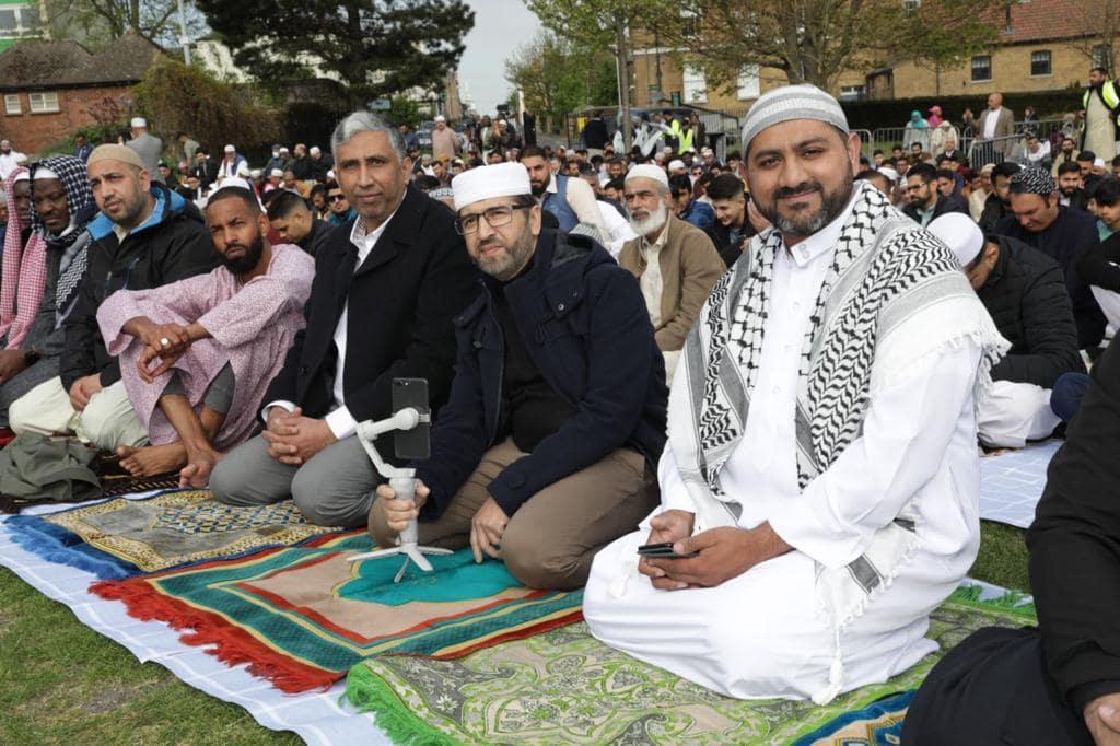 Men kneeling praying