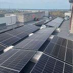 Solar panels installed on top of a building