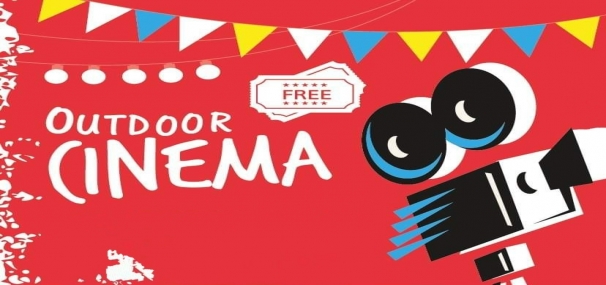 Red poster: outdoor cinema on community square.