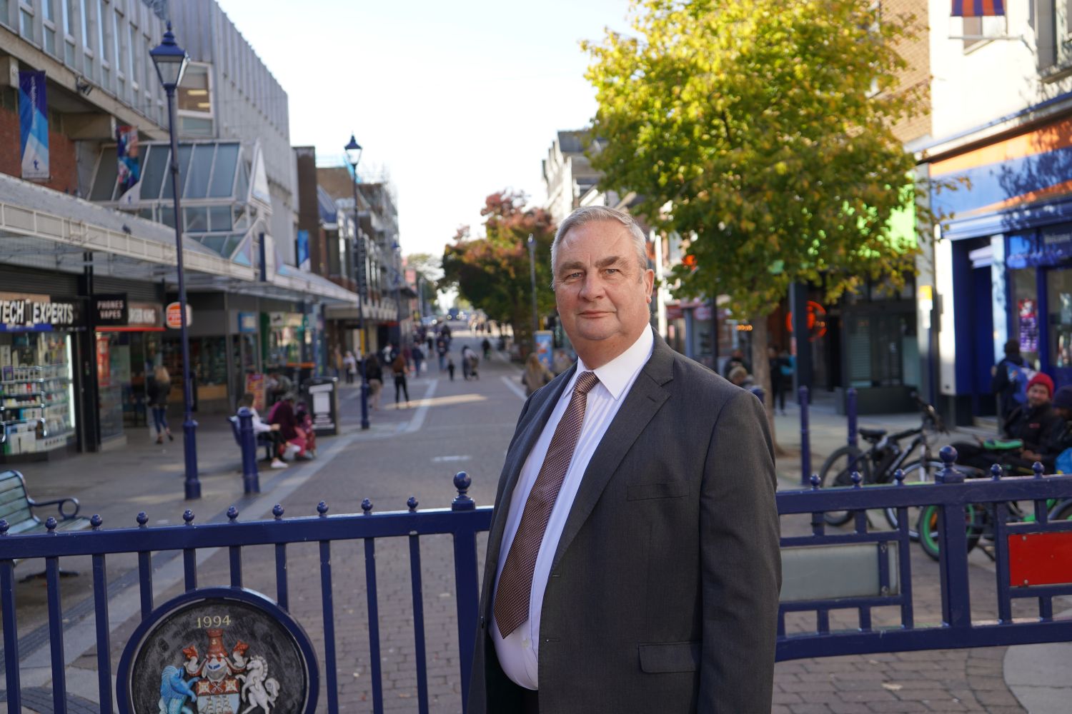 Councillor John Burden standing in Gravesend town centre high street