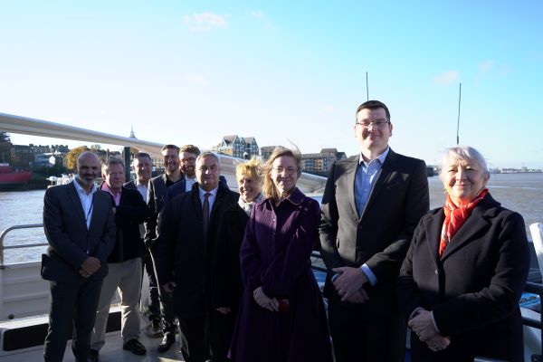 Group of delegates on Thames Clipper trip off Gravesend