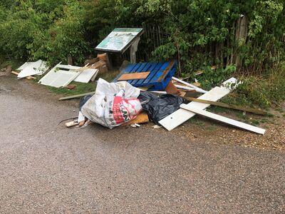 Fly tip on the side of road