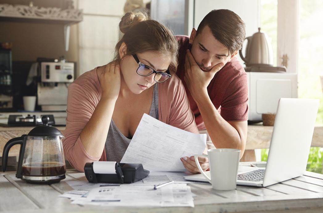 Couple calculating bills